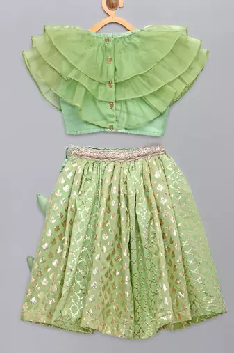 Lime green organza ruffled blouse with cotton zari lehnga