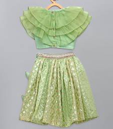 Lime green organza ruffled blouse with cotton zari lehnga