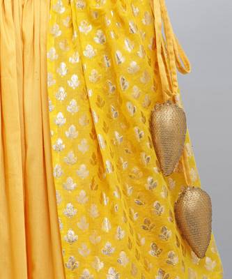 Mustard blouse with attached net dupatta and double layered lehnga 5