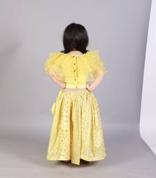 Lime yellow organza ruffled blouse with cotton zari lehnga