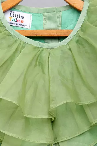 Lime green organza ruffled blouse with cotton zari lehnga