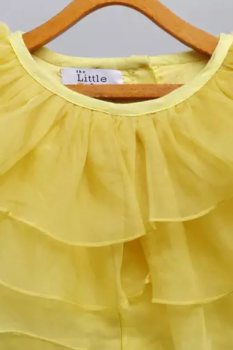 Lime yellow organza ruffled blouse with cotton zari lehnga