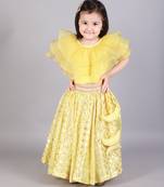 Lime yellow organza ruffled blouse with cotton zari lehnga