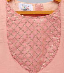 Peach frilly top with double layered net lehnga