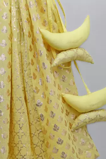 Lime yellow organza ruffled blouse with cotton zari lehnga