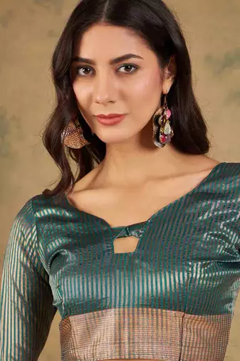 teal zari woven organza saree with unstitched blouse piece