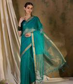 teal  organza  saree with unstitched blouse piece