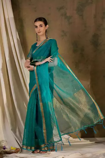 teal organza saree with unstitched blouse piece