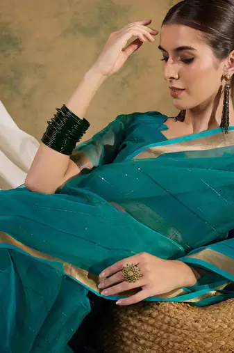 teal organza saree with unstitched blouse piece