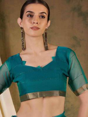 teal organza saree with unstitched blouse piece 5