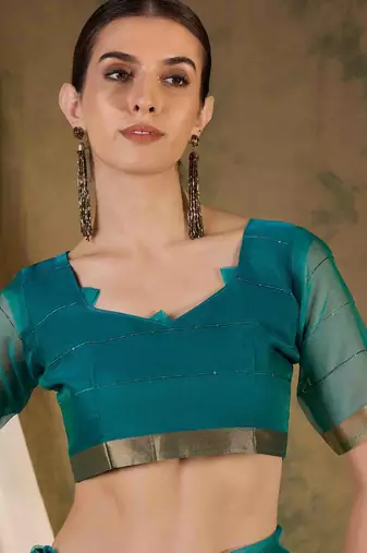 teal organza saree with unstitched blouse piece