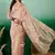 peach zari woven banarasi organza saree with unstitched blouse piece