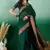 green zari woven banarasi organza saree with unstitched blouse piece