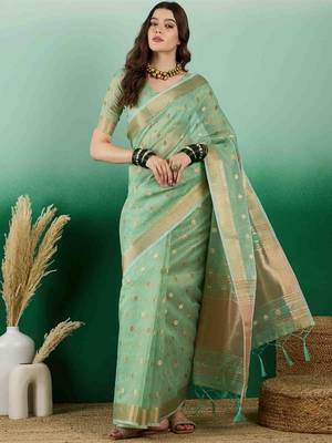 green jacquard design banarasi organza saree with unstitched blouse piece 1
