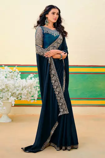Peacock blue embroidered heavy partywear saree
