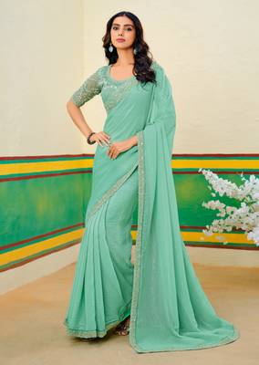 Teal green embroidered heavy partywear saree 1