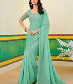 Teal green embroidered heavy partywear saree