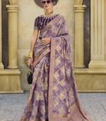 Purple jacquard silk woven saree with embroidered blouse