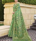 Green jacquard silk woven saree with embroidered blouse