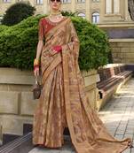 Rust orange jacquard silk woven saree with embroidered blouse