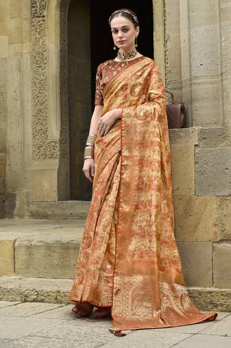 Orange jacquard silk woven saree with embroidered blouse