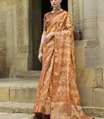 Orange jacquard silk woven saree with embroidered blouse