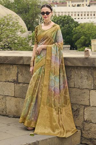 Avocado green jacquard silk woven saree with embroidered blouse