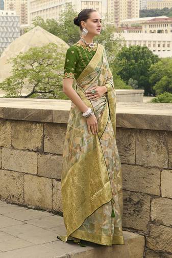 Green jacquard silk woven saree with embroidered blouse