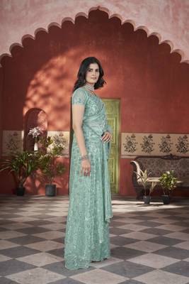 Sea green tissue net glamorous partywear saree 6