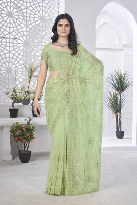 Green girlie tissue net c embroidered saree 1