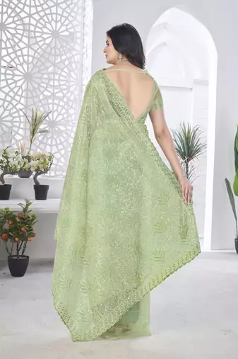 Green girlie tissue net c embroidered saree