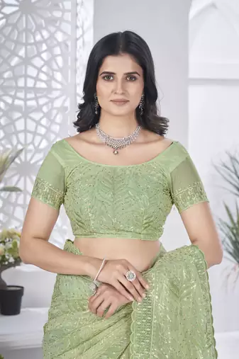 Green girlie tissue net c embroidered saree
