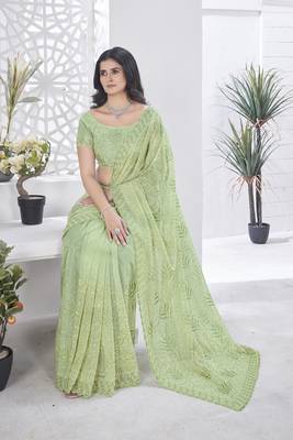 Green girlie tissue net c embroidered saree 6