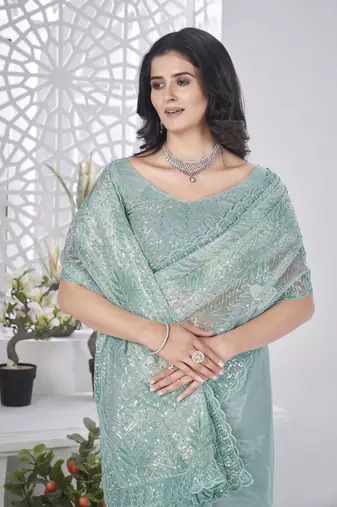 Sea green girlie tissue net c embroidered saree