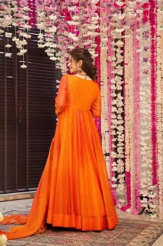 Glamorous bollywood style orange chinon partywear gown