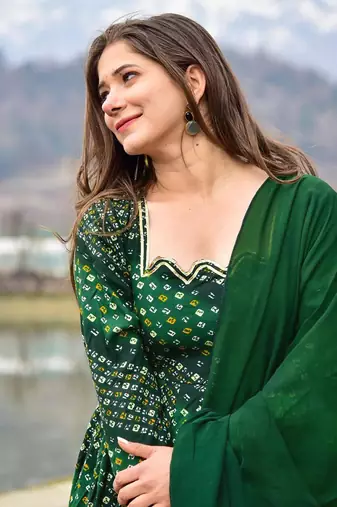 Glamorous bollywood style green rayon partywear gown