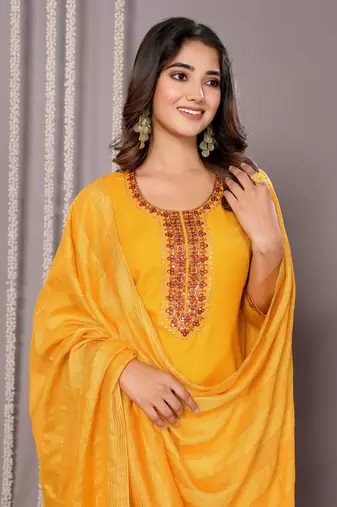 Mustard blended cotton fabric salwar suit with embroidered work