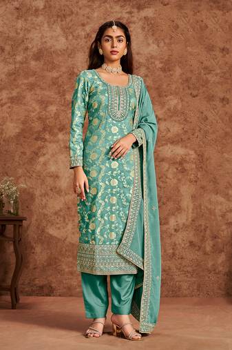 Sea green dola silk fabric heavy woven designer and embroidered suit