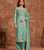 Sea green dola silk fabric heavy woven designer and embroidered suit