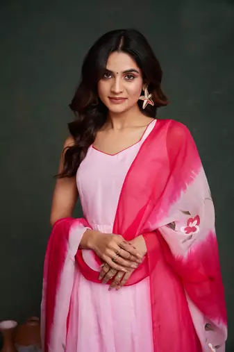 Pink viscosee organza fabric salwar kameez with sophisticated hand printed