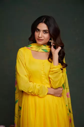 Yellow viscosee organza fabric salwar kameez with sophisticated hand printed