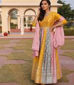 Mustard glamorous rangoli silk fabric sequence embroidery work heavy ceremonial attire
