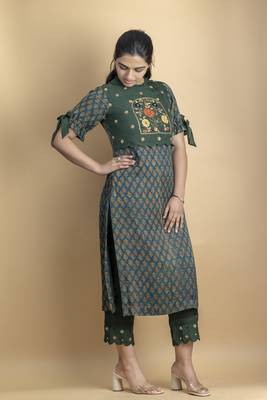 Pine green kurta set embellished with beautiful zardozi and intricate details on pure ajrakh fabric 1