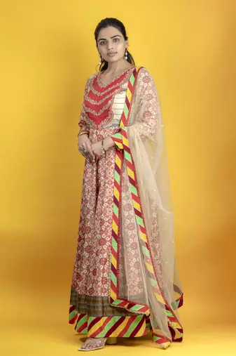 Beige floor length pure south silk fabric patola print anarkali embellised with embroided dupatta
