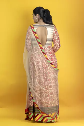 Beige floor length pure south silk fabric patola print anarkali embellised with embroided dupatta