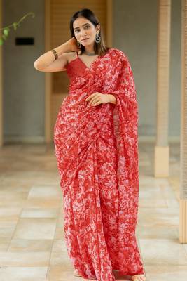 Coral red chiffon floral print saree with unstitched blouse piece 1