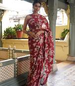 Dark red chiffon floral print saree with unstitched blouse piece