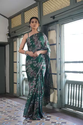 Dark teal chiffon floral print saree with unstitched blouse piece
