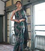 Dark teal chiffon floral print saree with unstitched blouse piece