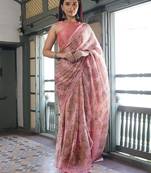Peach pink chiffon floral print saree with unstitched blouse piece